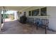 View of the covered patio with grill and outdoor seating area at 759 W Los Lagos Vista Ave, Mesa, AZ 85210