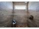 The walk-in shower features gray tiles and a window for natural light at 759 W Los Lagos Vista Ave, Mesa, AZ 85210
