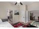 Cozy bedroom with versatile access to the bathroom and dining area at 7762 E Russell Cir, Mesa, AZ 85207