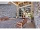 Inviting entrance to building featuring stone accents, benches, and pavers at 7762 E Russell Cir, Mesa, AZ 85207