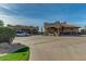 Well-maintained golf club buildings with desert landscaping and convenient parking at 7762 E Russell Cir, Mesa, AZ 85207