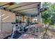 Outdoor gym area equipped with spinning bikes under a covered patio at 7762 E Russell Cir, Mesa, AZ 85207