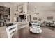 Open kitchen and living area featuring a breakfast bar and ample seating areas for Gathering and guests at 7762 E Russell Cir, Mesa, AZ 85207