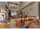 Bright lobby boasts high ceilings, a stone fireplace, comfortable seating, and refined decor at 7762 E Russell Cir, Mesa, AZ 85207