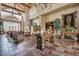 Beautiful lobby with high ceilings, chandeliers, tile flooring, and comfortable seating at 7762 E Russell Cir, Mesa, AZ 85207