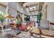 Spacious lobby showcasing a stone fireplace, comfortable seating, and beautiful decor at 7762 E Russell Cir, Mesa, AZ 85207