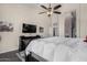 The bedroom features a dark wood dresser and a neutral color scheme at 7762 E Russell Cir, Mesa, AZ 85207
