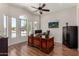 Spacious home office with wood floors, plenty of natural light, and ample storage at 7762 E Russell Cir, Mesa, AZ 85207
