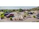 Well-maintained parking lot with designated handicapped parking spaces and desert landscaping at 7762 E Russell Cir, Mesa, AZ 85207