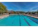 The long community pool offers ample space for swimming laps or leisurely floating at 7762 E Russell Cir, Mesa, AZ 85207