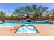 Luxurious pool and spa area, with waterfall features and inviting water, for a relaxing and resort-like experience at 7762 E Russell Cir, Mesa, AZ 85207