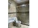 Bathroom features a glass door shower and modern sink at 8110 N 31St Dr, Phoenix, AZ 85051