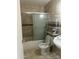 This bathroom features a shower/tub combo, tile flooring and walls, and essential fixtures at 8110 N 31St Dr, Phoenix, AZ 85051