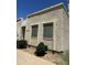 Exterior shot highlighting the textured stucco siding of a single-story home, complemented by well-placed shrubbery at 8110 N 31St Dr, Phoenix, AZ 85051