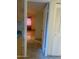 Hallway showing the tile floor and the doorway to another room at 8110 N 31St Dr, Phoenix, AZ 85051