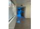 Hallway with tile flooring leading to the kitchen at 8110 N 31St Dr, Phoenix, AZ 85051