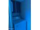 Laundry room features a white washing machine and storage above at 8110 N 31St Dr, Phoenix, AZ 85051