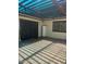 Back patio area with metal door and shade structure at 8110 N 31St Dr, Phoenix, AZ 85051