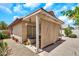 Exterior view of the covered patio showcasing an enclosed hot tub, perfect for relaxation and privacy at 871 N Granada Dr, Chandler, AZ 85226