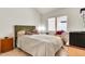 Bright bedroom with a neutral bedspread and a view of the backyard at 871 N Granada Dr, Chandler, AZ 85226