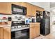 Functional kitchen with stainless steel appliances and ample cabinet space at 871 N Granada Dr, Chandler, AZ 85226