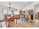 Bright eat-in kitchen with a breakfast bar, tile flooring, and modern appliances at 871 N Granada Dr, Chandler, AZ 85226