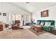 Cozy living room featuring a sliding glass door for access to the outdoor living spaces at 871 N Granada Dr, Chandler, AZ 85226