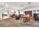 Spacious living area featuring comfortable seating, carpeted floors, and an open layout at 871 N Granada Dr, Chandler, AZ 85226