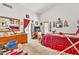 Bright bedroom featuring a view of the ensuite bathroom and ample natural light at 871 N Granada Dr, Chandler, AZ 85226