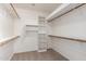 Walk-in closet featuring shelving and hanging rods for optimal storage at 9563 E Keats Ave, Mesa, AZ 85209