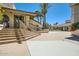 Building exterior featuring stairs and outdoor seating area with pavers at 9707 E Mountain View Rd # 1408, Scottsdale, AZ 85258