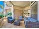Cozy patio with comfortable outdoor seating and views of the surrounding landscape at 9707 E Mountain View Rd # 1408, Scottsdale, AZ 85258