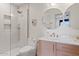 Modern bathroom featuring double vanity, walk-in shower and neutral tile at 9708 E Via Linda Rd # 1350, Scottsdale, AZ 85258