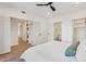 Spacious bedroom with ensuite bathroom, hardwood floors, and walk-in closet at 9708 E Via Linda Rd # 1350, Scottsdale, AZ 85258