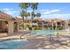 Inviting community pool and spa area with lounge chairs and palm trees offer a relaxing outdoor retreat for residents at 9708 E Via Linda Rd # 1350, Scottsdale, AZ 85258