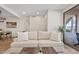Inviting living room with neutral tones, balcony view, and an open flow into the dining area at 9708 E Via Linda Rd # 1350, Scottsdale, AZ 85258