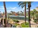 Scenic view of well-maintained tennis courts with water features, palm trees, and desert landscaping create a resort-style atmosphere at 9708 E Via Linda Rd # 1350, Scottsdale, AZ 85258