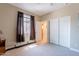 Bright bedroom with a window, closet, and neutral-toned walls at 102 W Raven Dr, Chandler, AZ 85286