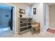 Inviting entryway featuring decorative furniture and a view into another room at 102 W Raven Dr, Chandler, AZ 85286