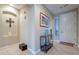 Welcoming foyer with neutral paint, tiled floor, and elegant decor at 102 W Raven Dr, Chandler, AZ 85286