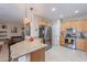 Modern kitchen featuring granite countertops, stainless steel appliances, and ample cabinet space at 102 W Raven Dr, Chandler, AZ 85286