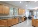 Well-lit kitchen featuring modern appliances and plenty of countertop space with a dining area at 102 W Raven Dr, Chandler, AZ 85286