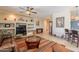 Spacious living room with a ceiling fan, recessed lights and integrated shelves at 102 W Raven Dr, Chandler, AZ 85286