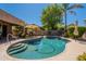 Backyard pool features with outdoor lounge space and bar-b-que area at 102 W Raven Dr, Chandler, AZ 85286