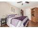 Bedroom offers wood floors, ceiling fan and natural light at 10505 W Campana Dr, Sun City, AZ 85351