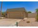 Single-story home with desert landscaping and attached two-car garage at 10505 W Campana Dr, Sun City, AZ 85351
