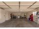 Spacious garage with ample storage, laundry machines, and room for vehicles at 10505 W Campana Dr, Sun City, AZ 85351