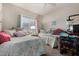 Comfortable bedroom features two beds and a window for natural light at 11375 E Sahuaro Dr # 1062, Scottsdale, AZ 85259