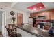 Functional kitchen with stainless steel appliances, ample cabinet space, and granite counters at 11375 E Sahuaro Dr # 1062, Scottsdale, AZ 85259