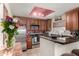 Modern kitchen with stainless steel appliances, granite countertops, and abundant cabinet space at 11375 E Sahuaro Dr # 1062, Scottsdale, AZ 85259